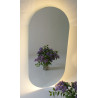 Mirror with LED lighting pill-shaped